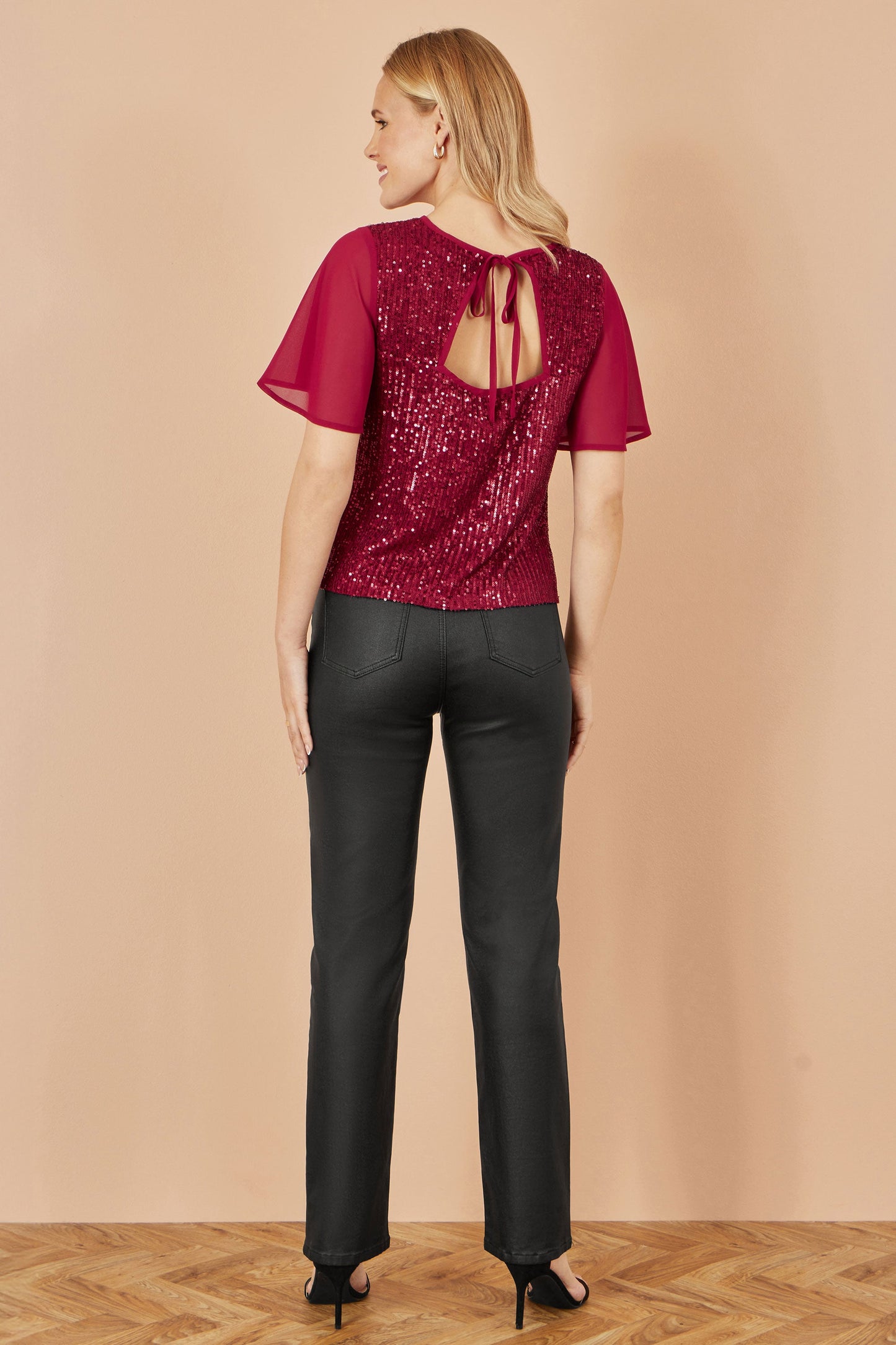 Yumi Burgundy Sequin Top With Sheer Sleeves And Cut Out Back