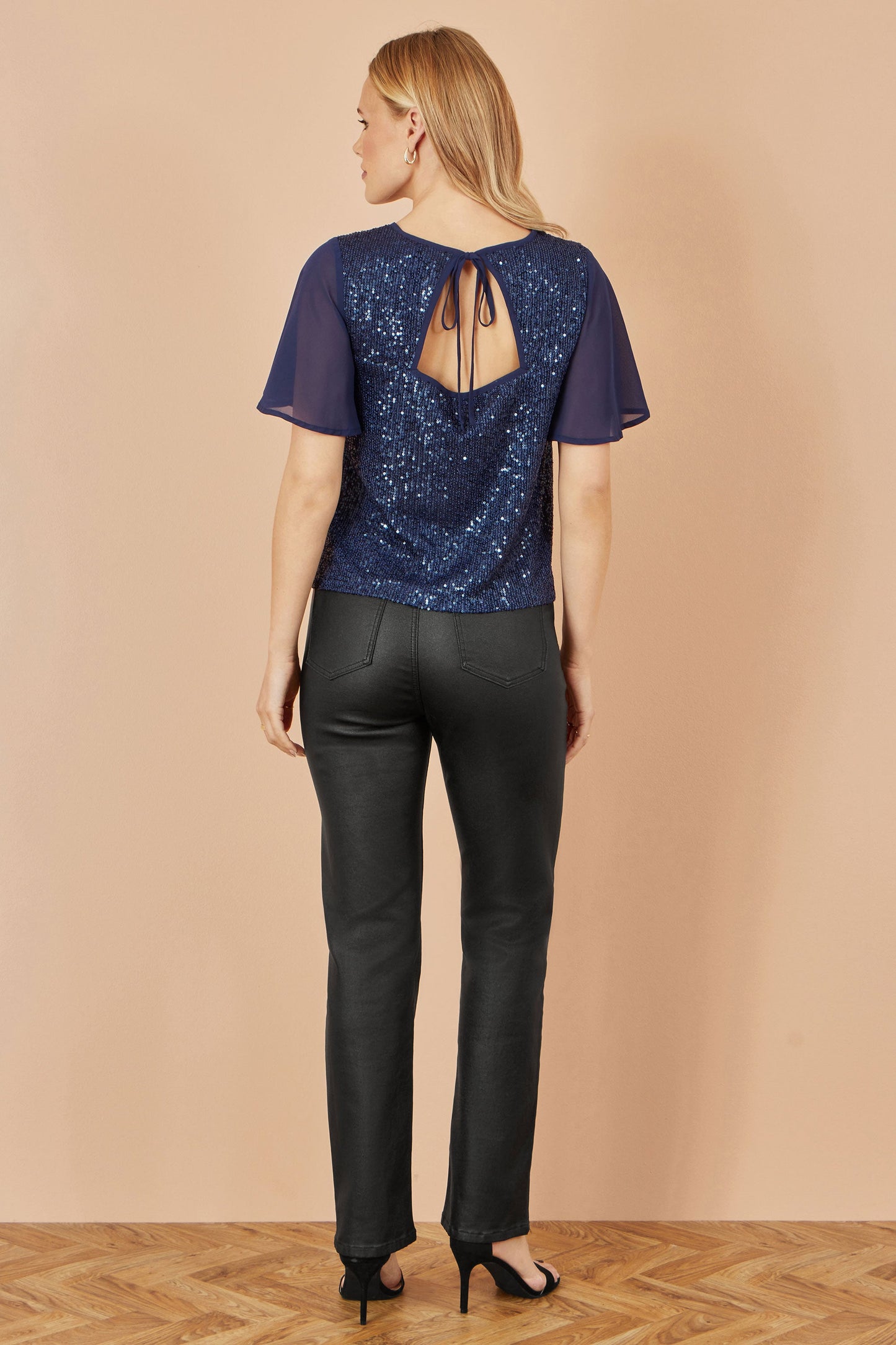 Yumi Navy Sequin Top With Sheer Sleeves And Cut Out Back