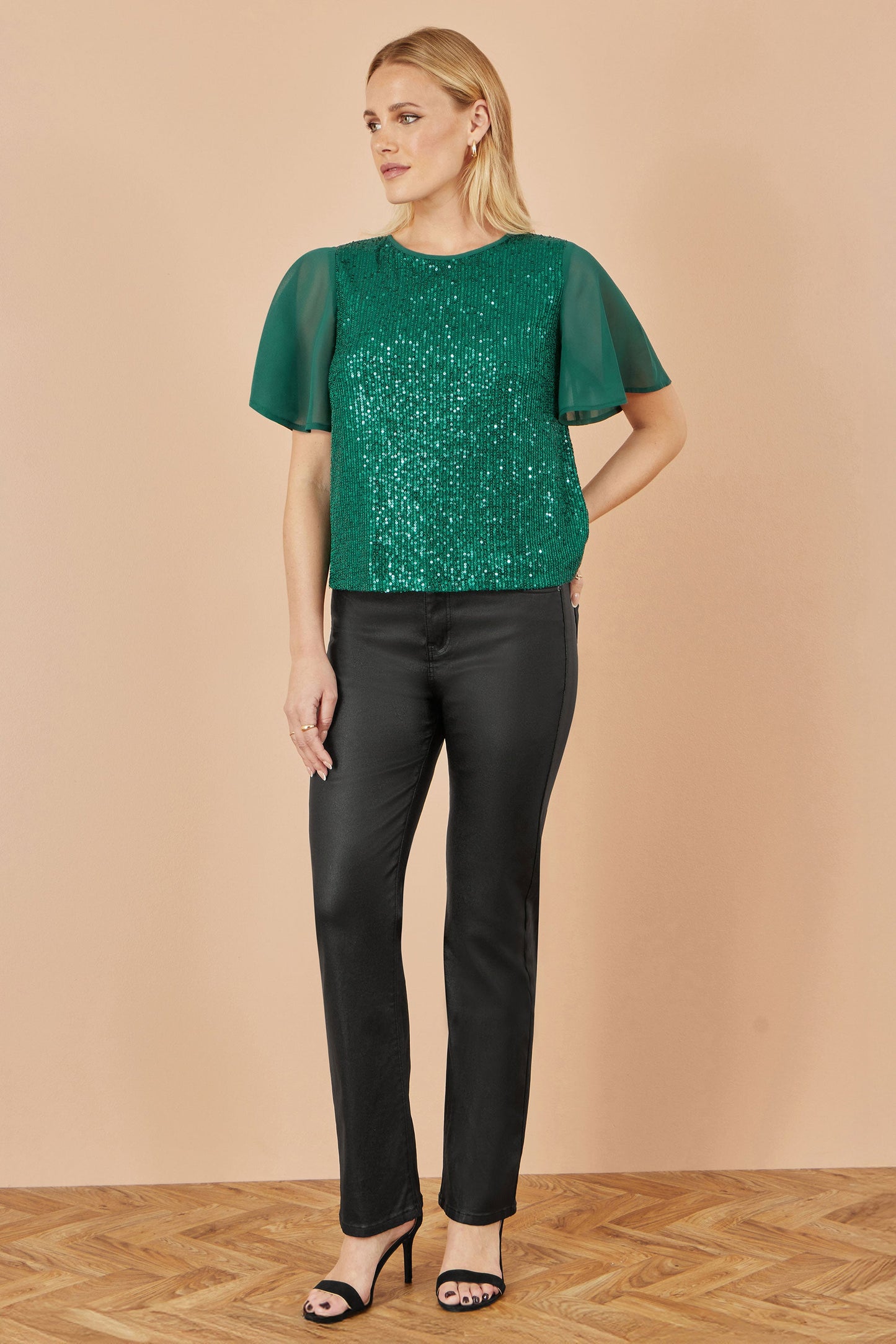 Yumi Green Sequin Top With Sheer Sleeves And Cut Out Back