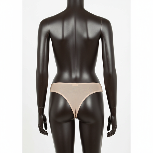 Dark mannequin wearing X-Ray nude thong - back view