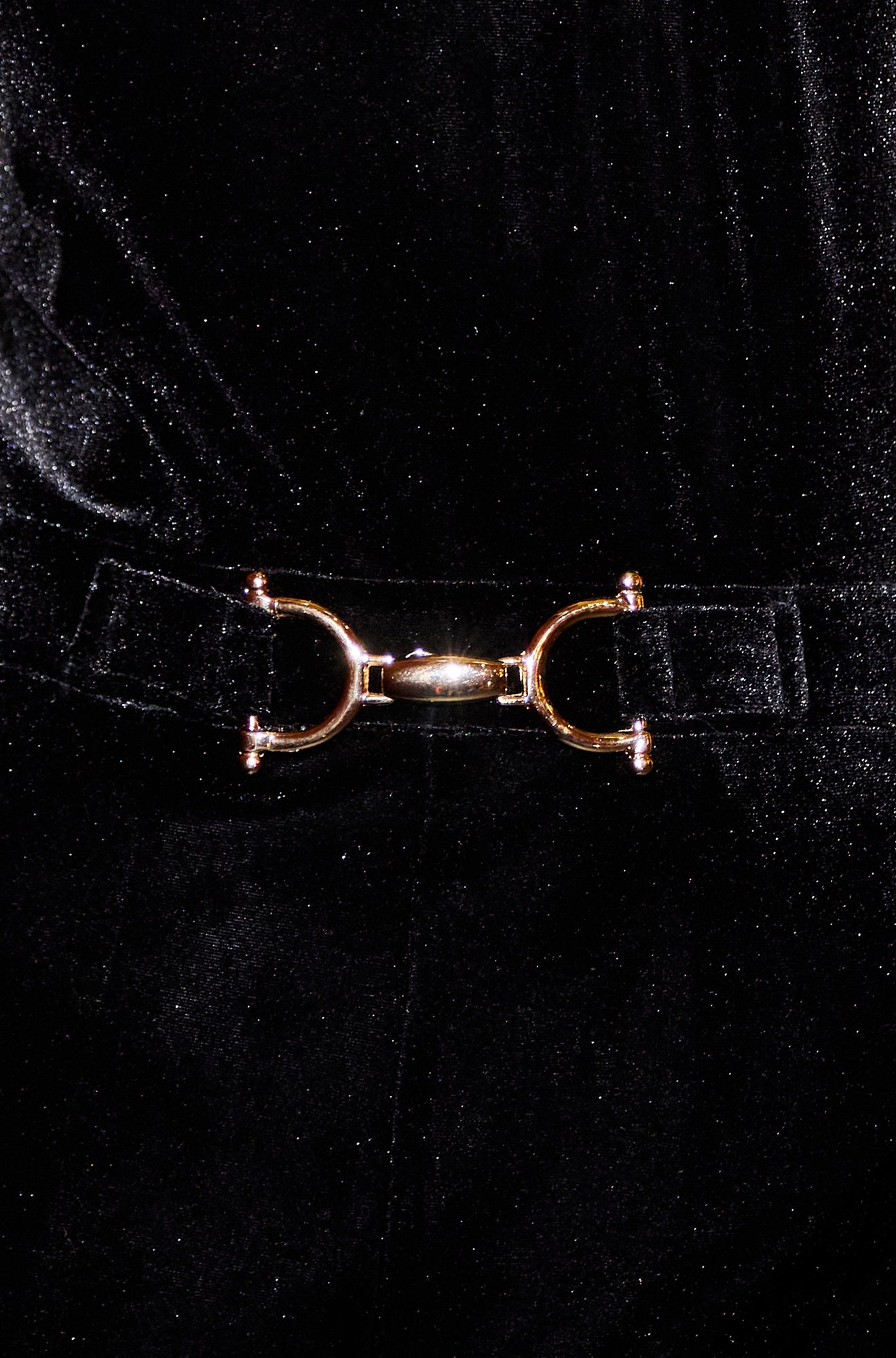 Yumi Black Velvet Jumpsuit With Twist Neckline And Buckle Belt