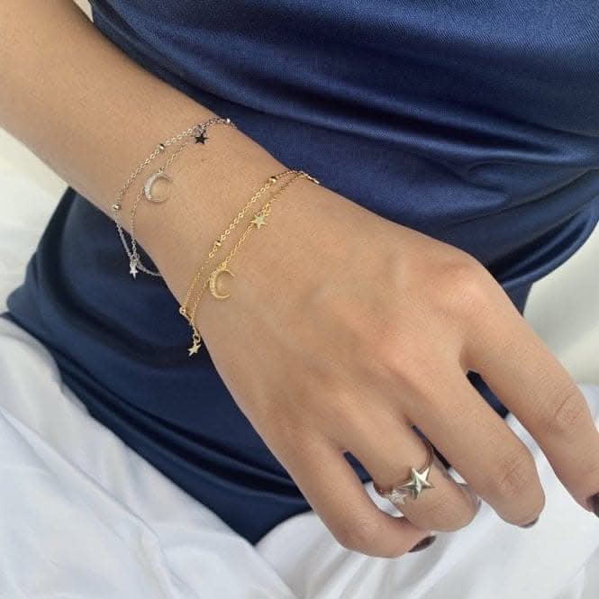 Sterling Silver Rhodium Plated Moon And Stars Charm Bracelet ERLB019